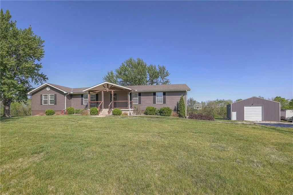 12411 S BYNUM RD, LONE JACK, MO 64070, photo 1 of 66